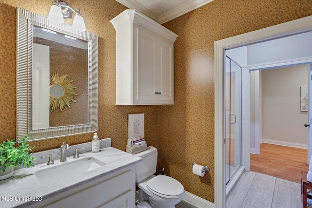 210 Planters Grv, Brandon, MS 39047 - full bath with wallpapered walls, toilet, crown molding, a stall shower, and vanity