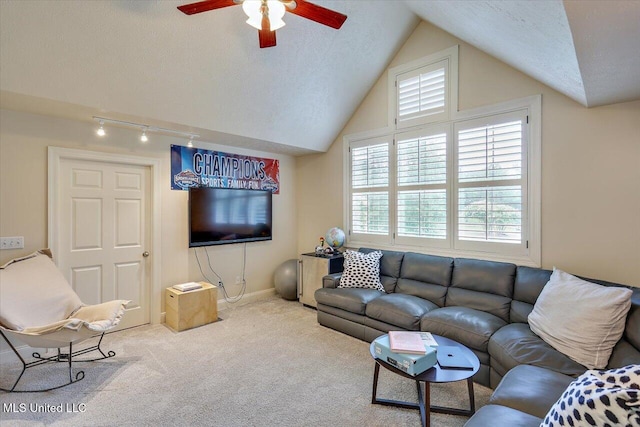 210 Planters Grv, Brandon, MS 39047 - carpeted living room with a ceiling fan, track lighting, lofted ceiling, and a textured ceiling