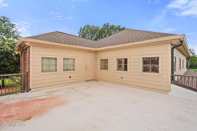 210 Planters Grv, Brandon, MS 39047 - back of house with roof with shingles and a patio
