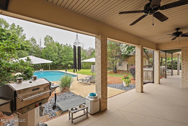 210 Planters Grv, Brandon, MS 39047 - view of patio featuring a ceiling fan and an outdoor pool