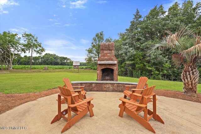 210 Planters Grv, Brandon, MS 39047 - view of patio with an outdoor brick fireplace