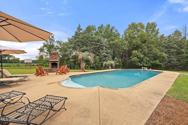 210 Planters Grv, Brandon, MS 39047 - swimming pool featuring a patio, an outdoor brick fireplace, and a diving board