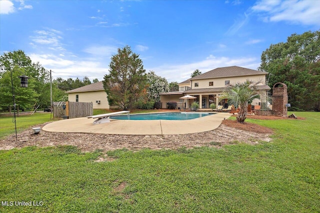 210 Planters Grv, Brandon, MS 39047 - swimming pool with a diving board, a lawn, and a patio
