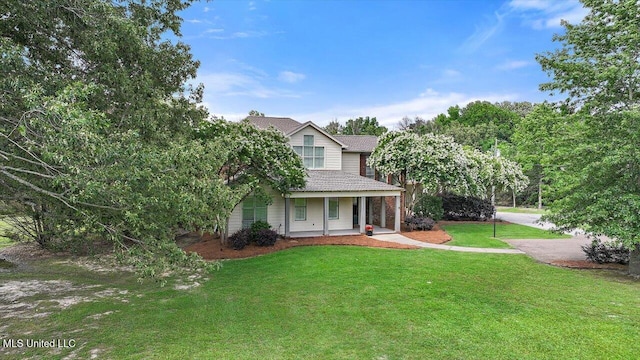 210 Planters Grv, Brandon, MS 39047 - view of front facade featuring covered porch, a front lawn, and a shingled roof