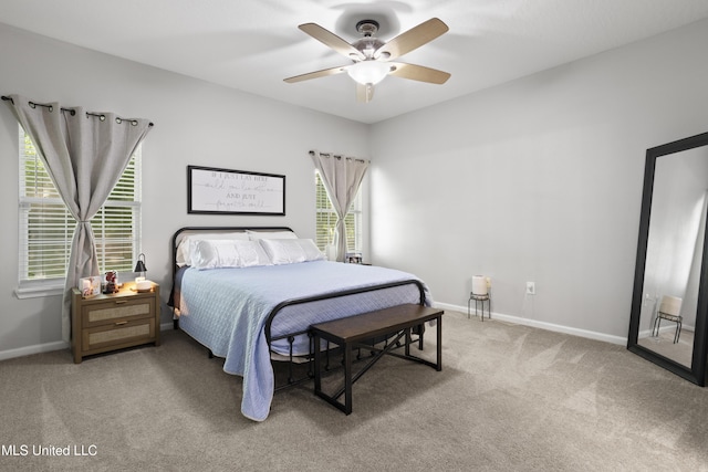 6507 Shoshonee Dr, Ocean Springs, MS 39564 - carpeted bedroom with baseboards and a ceiling fan