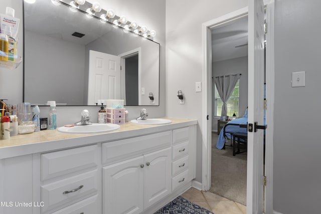 6507 Shoshonee Dr, Ocean Springs, MS 39564 - bathroom with double vanity, ensuite bath, and tile patterned floors
