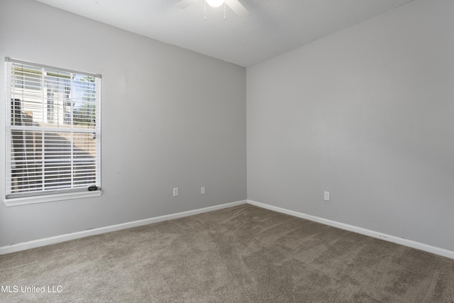 6507 Shoshonee Dr, Ocean Springs, MS 39564 - empty room with carpet, baseboards, and ceiling fan