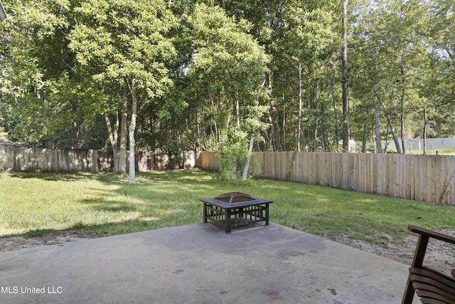 6507 Shoshonee Dr, Ocean Springs, MS 39564 - view of patio / terrace with an outdoor fire pit