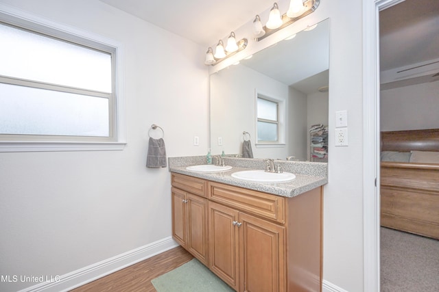 18108 Steamer Way, Gulfport, MS 39503 - full bath featuring double vanity, baseboards, and wood finished floors