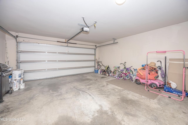 18108 Steamer Way, Gulfport, MS 39503 - garage featuring a garage door opener