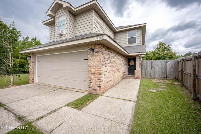 18108 Steamer Way, Gulfport, MS 39503 - view of front of house featuring brick siding, an attached garage, a shingled roof, concrete driveway, and cooling unit
