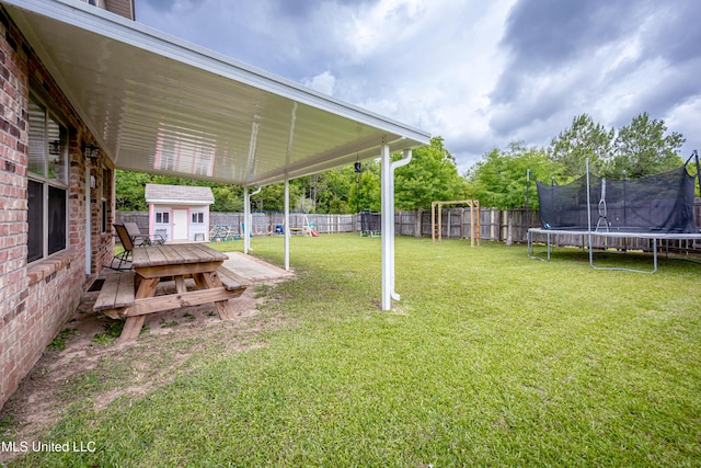 18108 Steamer Way, Gulfport, MS 39503 - view of yard featuring a trampoline and a deck