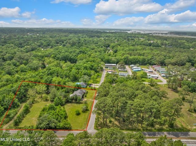 view of property location featuring a forest and property boundaries highlighted