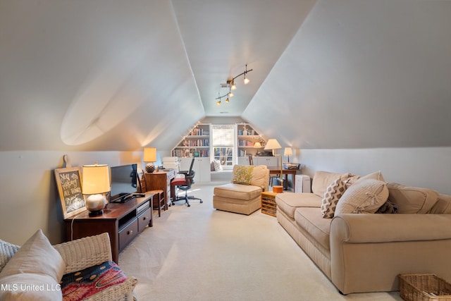 carpeted living room with lofted ceiling