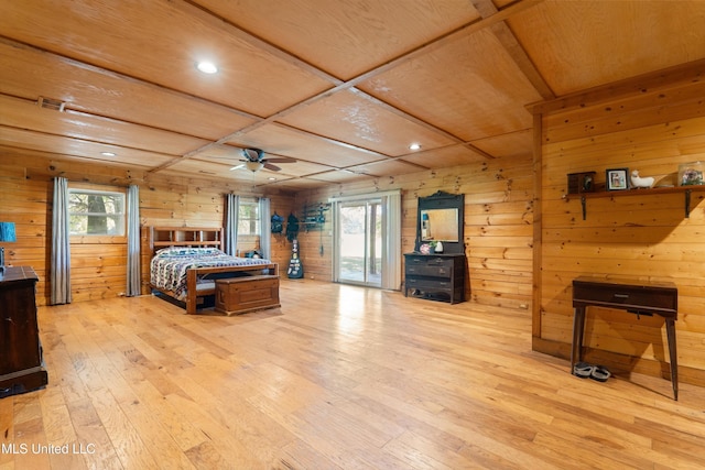 927 Abe Chapel Rd, Como, MS 38619 - bedroom featuring wooden walls, hardwood / wood-style floors, access to exterior, recessed lighting, and wood ceiling