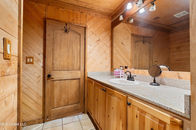 927 Abe Chapel Rd, Como, MS 38619 - bathroom featuring wood walls, vanity, tile patterned flooring, and wooden ceiling