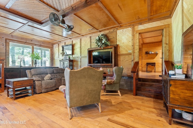 927 Abe Chapel Rd, Como, MS 38619 - living area with wood walls, light wood-style floors, and wooden ceiling