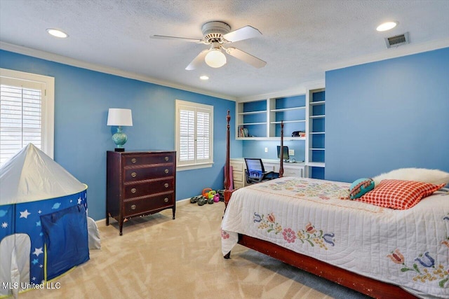 carpeted bedroom with recessed lighting, visible vents, a textured ceiling, and crown molding