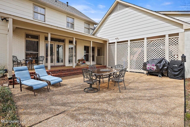 view of patio / terrace featuring a grill