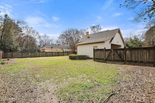 view of yard with fence