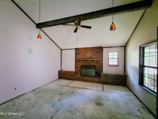 unfurnished living room with lofted ceiling with beams, a fireplace, and ceiling fan