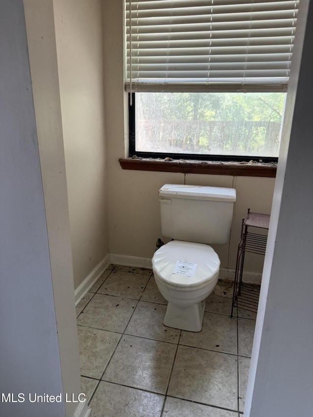 407 N Thunderbird Rd, Hernando, MS 38632 - bathroom featuring toilet and tile patterned floors