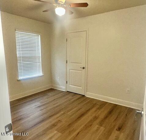 14816 Canal Crossing Blvd, Gulfport, MS 39503 - unfurnished room featuring wood finished floors and ceiling fan