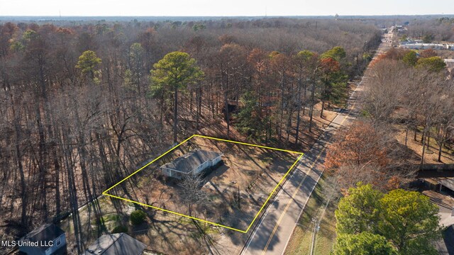 219 E Jackson St, Ridgeland, MS 39157 - bird's eye view featuring a view of trees
