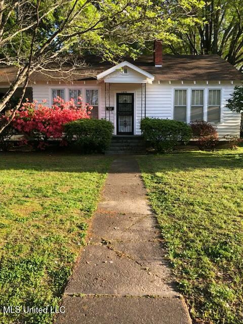 109 Hightower St, Sardis, MS 38666 - view of front facade with a front yard