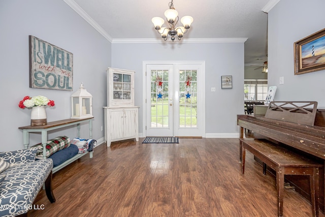 13109 Little Bluff Dr, Vancleave, MS 39565 - foyer entrance featuring a chandelier, wood finished floors, crown molding, and a ceiling fan