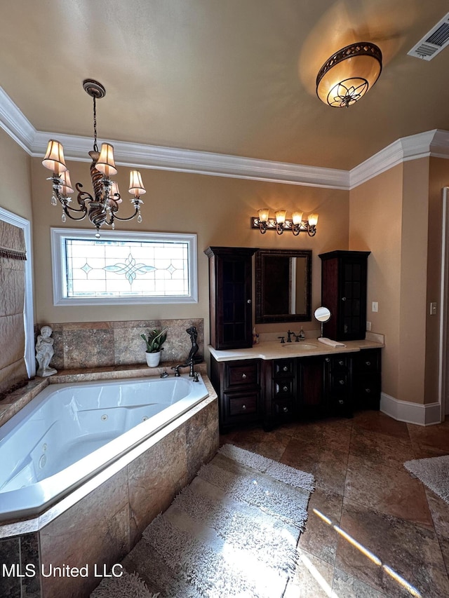 bathroom featuring a relaxing tiled tub, ornamental molding, vanity, and a notable chandelier