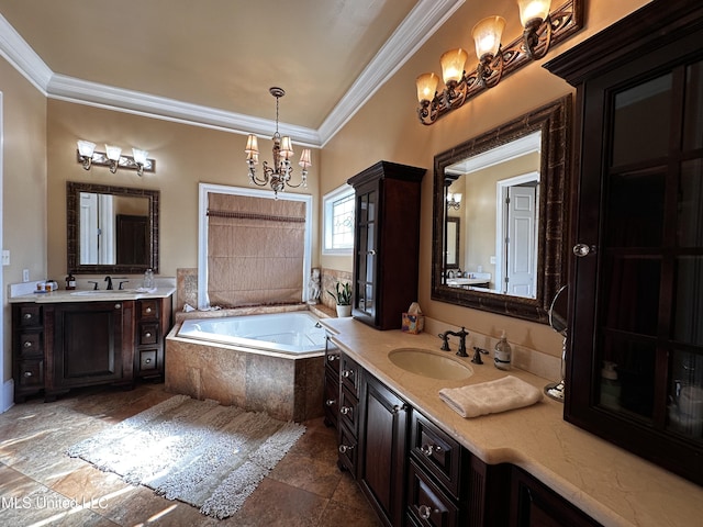 bathroom with a notable chandelier, ornamental molding, vanity, and tiled tub