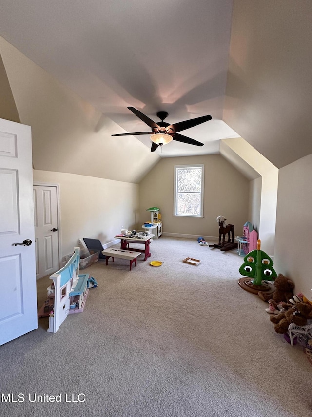 recreation room with carpet, lofted ceiling, and ceiling fan