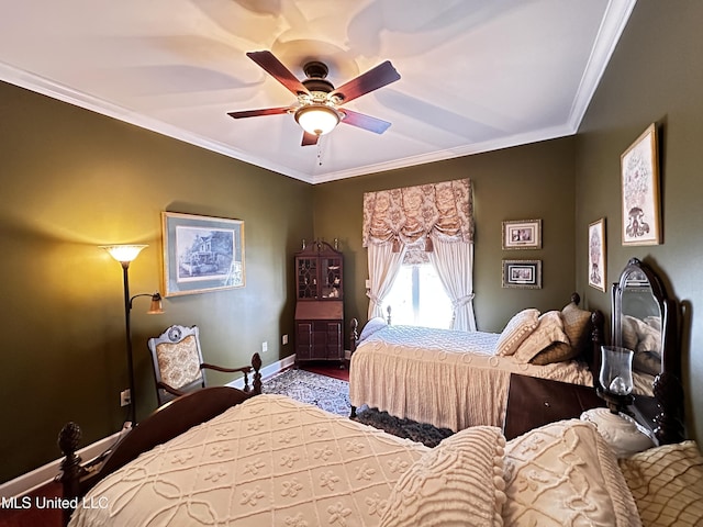 bedroom with ceiling fan, ornamental molding, and hardwood / wood-style floors