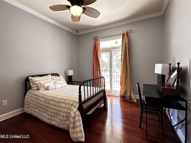 bedroom with crown molding and dark hardwood / wood-style floors