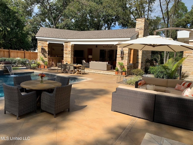 exterior space with an outdoor living space, outdoor dining area, fence, and a fenced in pool