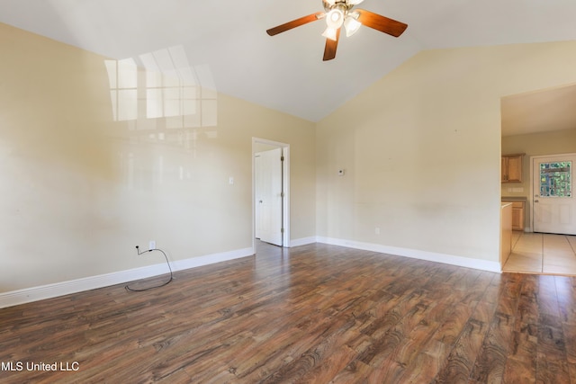 unfurnished room featuring ceiling fan, wood-type flooring, and vaulted ceiling