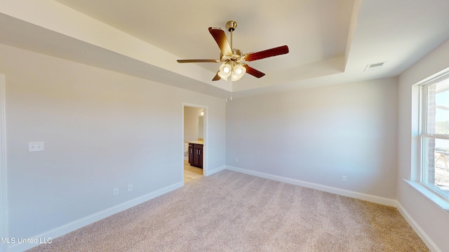 7881 Gardendale Dr, Olive Branch, MS 38654 - spare room with light colored carpet, healthy amount of natural light, and a raised ceiling