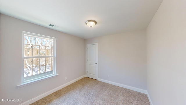 7881 Gardendale Dr, Olive Branch, MS 38654 - carpeted empty room with plenty of natural light