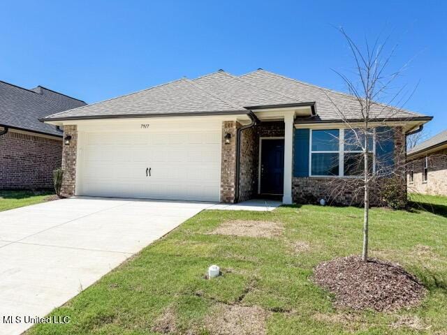 7881 Gardendale Dr, Olive Branch, MS 38654 - ranch-style home featuring a garage, a front lawn, driveway, brick siding, and a shingled roof