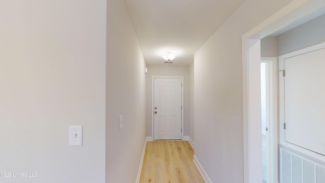 7881 Gardendale Dr, Olive Branch, MS 38654 - hallway with light wood-style flooring and baseboards
