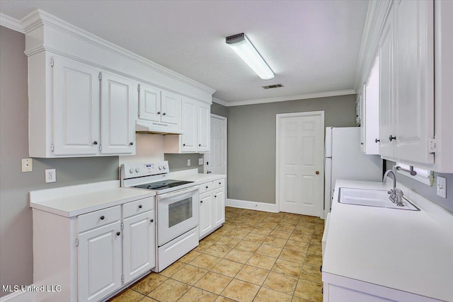 128 Chestnut Dr, Brandon, MS 39047 - kitchen with white appliances, light countertops, under cabinet range hood, white cabinetry, and crown molding