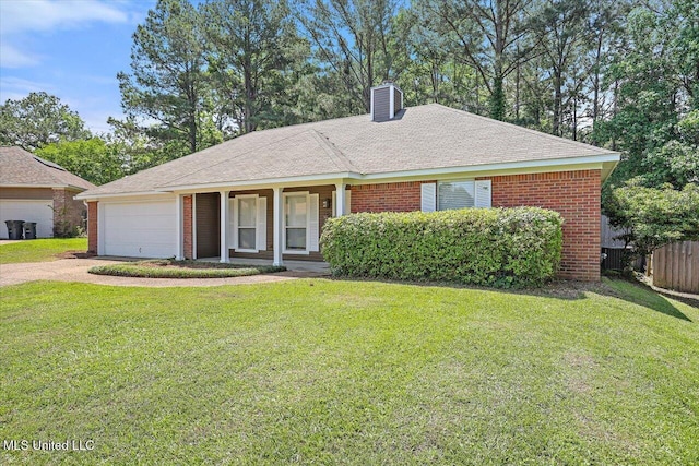 128 Chestnut Dr, Brandon, MS 39047 - view of front of property with a chimney, brick siding, a garage, and driveway