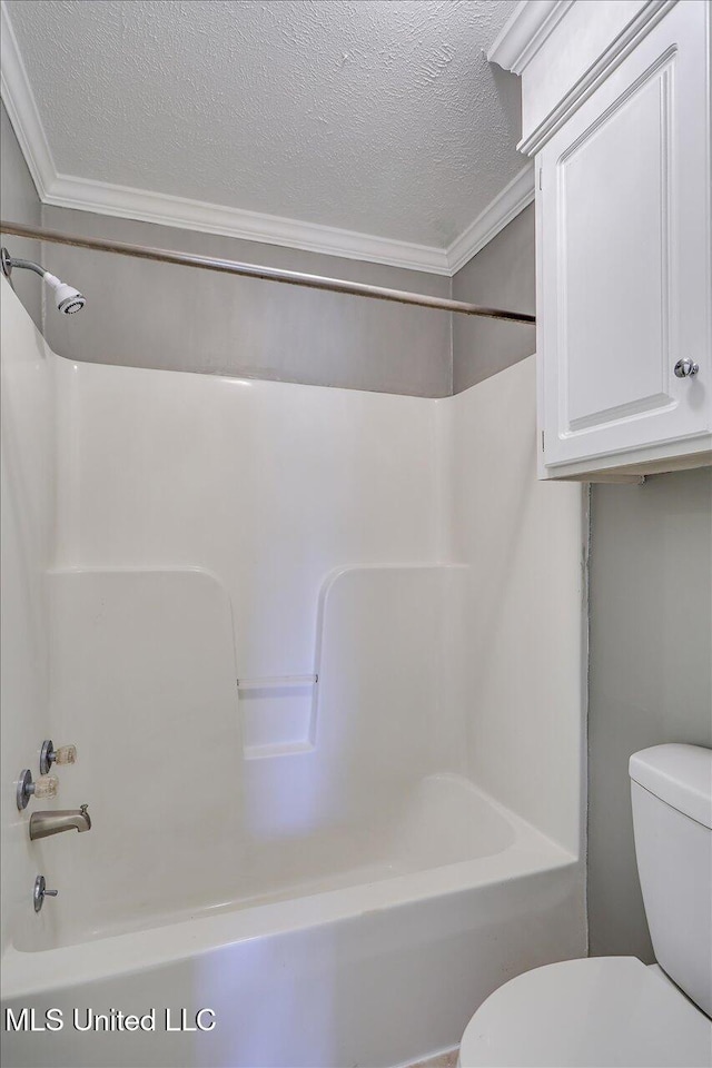 128 Chestnut Dr, Brandon, MS 39047 - full bathroom with crown molding, toilet, a textured ceiling, and  shower combination