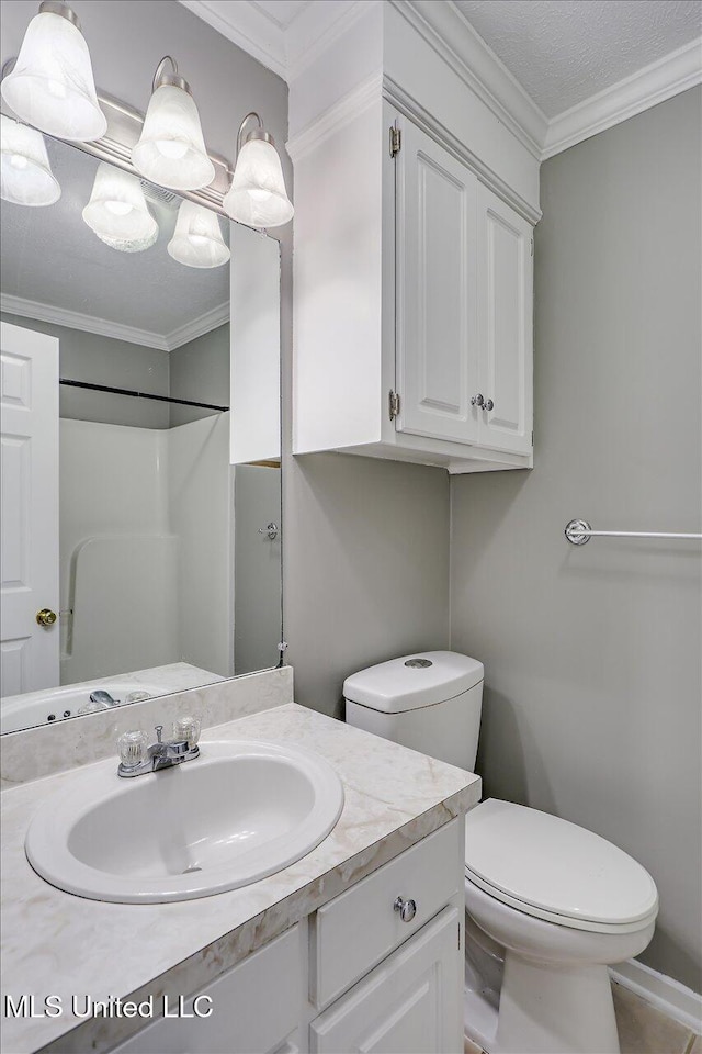 128 Chestnut Dr, Brandon, MS 39047 - bathroom with toilet, vanity, and ornamental molding