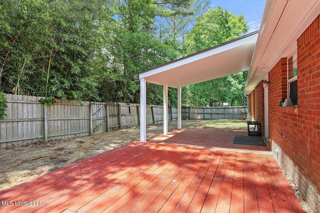 128 Chestnut Dr, Brandon, MS 39047 - wooden deck with a fenced backyard