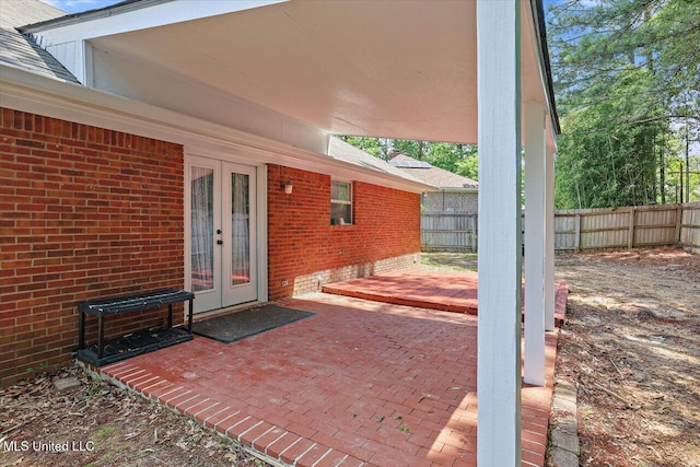128 Chestnut Dr, Brandon, MS 39047 - view of patio featuring french doors and fence