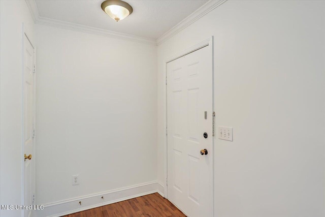 128 Chestnut Dr, Brandon, MS 39047 - doorway to outside featuring ornamental molding, dark wood finished floors, and baseboards