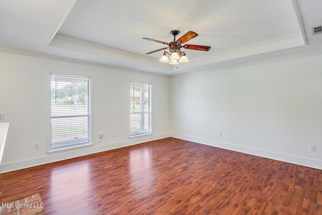 128 Chestnut Dr, Brandon, MS 39047 - empty room with a tray ceiling, wood finished floors, crown molding, a ceiling fan, and baseboards