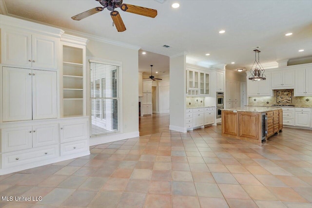 kitchen featuring beverage cooler, ceiling fan, crown molding, and white cabinets